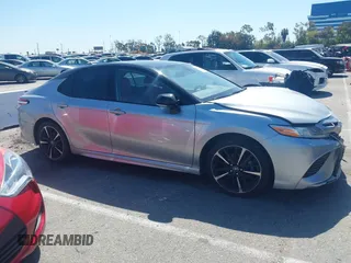 2020 Toyota Camry XSE with VIN 4T1K61AK1LU318098, listed as a IAAI auction lot 41838182 with 64,118 mi miles and . Bid and sale history available at DreamBid. Image 13.