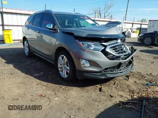 2019 Chevrolet Equinox Premier z VIN 3GNAXPEX0KS551658, wystawiony jako IAAI lot #41908227 z przebiegiem 49 535 mil mil oraz . Historia ofert i sprzedaży dostępna na DreamBid. Obrazek 1.