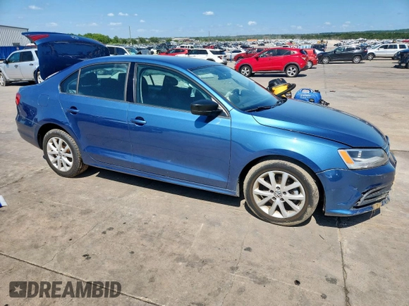 2015 Volkswagen Jetta SE with VIN 3VWD17AJ7FM272661, listed as a Copart auction lot 61285255 with 113,334 mi miles and Salvage title. Bid and sale history available at DreamBid. Image 4.