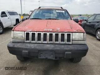 1994 Jeep Grand Cherokee Laredo с VIN 1J4GZ58S7RC311048, выставлен на аукционе Copart как лот 56759635 с пробегом 242 460 миль миль и Списание • Salvage title. История ставок и продаж доступна на DreamBid. Изображение 5.