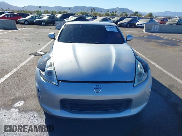 2014 Nissan 370Z Nismo with VIN JN1AZ4EHXEM634418, listed as a IAAI auction lot 41308580 with 84,074 mi miles and . Bid and sale history available at DreamBid. Image 12.