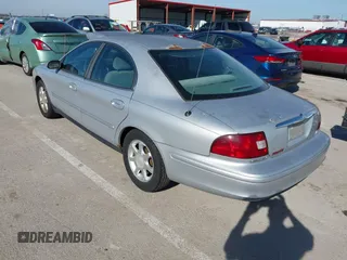 2003 Mercury Sable GS z VIN 1MEFM50U23A618707, wystawiony jako IAAI lot #41472629 z przebiegiem 172 377 mil mil oraz . Historia ofert i sprzedaży dostępna na DreamBid. Obrazek 3.