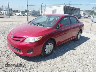 2011 Toyota Corolla L with VIN JTDBU4EE3B9124609, listed as a IAAI auction lot 42046571 with 59,617 mi miles. Bid and sale history available at carsss.com. Image 2.
