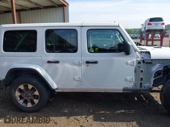 2018 Jeep Wrangler Unlimited Sahara z VIN 1C4HJXEG0JW321355, wystawiony jako IAAI lot #42343112 z przebiegiem 102 457 mil mil oraz . Historia ofert i sprzedaży dostępna na DreamBid. Obrazek 14.