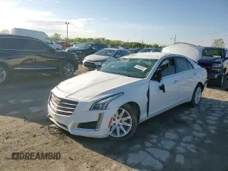 2015 Cadillac CTS RWD with VIN 1G6AP5SXXF0136820, listed as a Copart auction lot 54666385 with 129,763 mi miles and Clean title. Bid and sale history available at DreamBid. Image 14.
