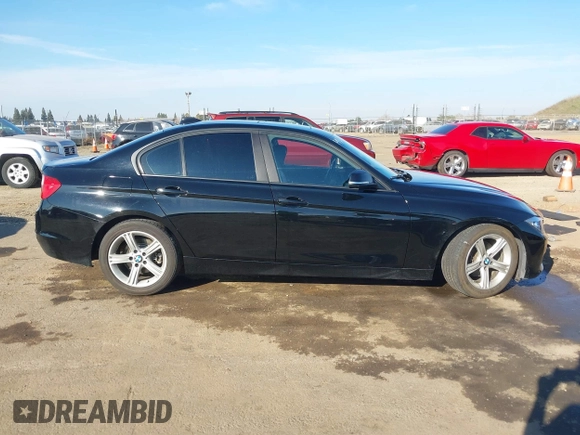 2014 BMW 3 Series 328i with VIN WBA3C1C55EK117180, listed as a IAAI auction lot 41389969 with 163,760 mi miles. Bid and sale history available at carsss.com. Image 13.