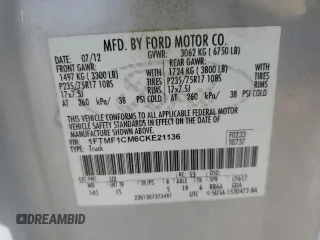 2012 Ford F-150 XL z VIN 1FTMF1CM6CKE21136, wystawiony jako Copart lot #48614935 z przebiegiem 157 107 mil mil oraz Szkoda całkowita • Salvage title. Historia ofert i sprzedaży dostępna na DreamBid. Obrazek 12.