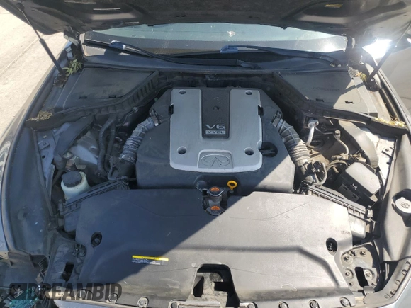 2014 Infiniti Q50 Premium with VIN JN1BV7AP2EM677469, listed as a Copart auction lot 61627125 with 106,670 mi miles and Salvage title. Bid and sale history available at DreamBid. Image 11.