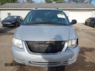 2005 Chrysler Town & Country with VIN 1C4GP45R55B238222, listed as a IAAI auction lot 41780737 with 166,880 mi miles. Bid and sale history available at carsss.com. Image 13.