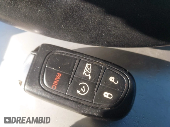 2015 Jeep Cherokee Trailhawk with VIN 1C4PJMBS3FW510219, listed as a IAAI auction lot 41440297 with 144,012 mi miles and . Bid and sale history available at DreamBid. Image 9.