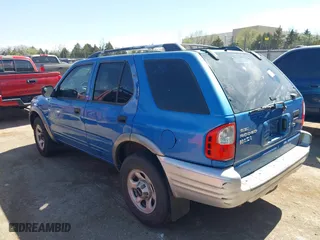 2001 Isuzu Rodeo S with VIN 4S2CK58W014315005, listed as a IAAI auction lot 41880618 with 147,384 mi miles. Bid and sale history available at carsss.com. Image 14.