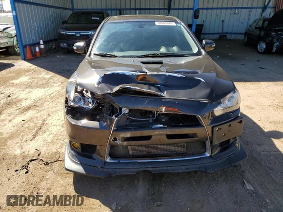 2015 Mitsubishi Lancer Evolution MR z VIN JA32W5FV5FU006111, wystawiony jako Copart lot #68985683 z przebiegiem 54 774 mil mil oraz . Historia ofert i sprzedaży dostępna na DreamBid. Obrazek 5.