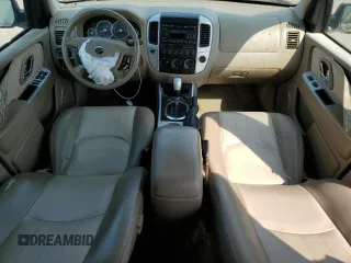 2006 Mercury Mariner Luxury with VIN 4M2YU57146KJ07465, listed as a Copart auction lot 62532264 with 126,009 mi miles and Salvage title. Bid and sale history available at DreamBid. Image 8.