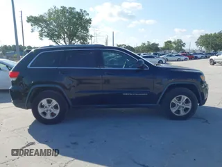 2014 Jeep Grand Cherokee Laredo with VIN 1C4RJEAG6EC136832, listed as a IAAI auction lot 42020647 with 151,639 mi miles. Bid and sale history available at carsss.com. Image 13.