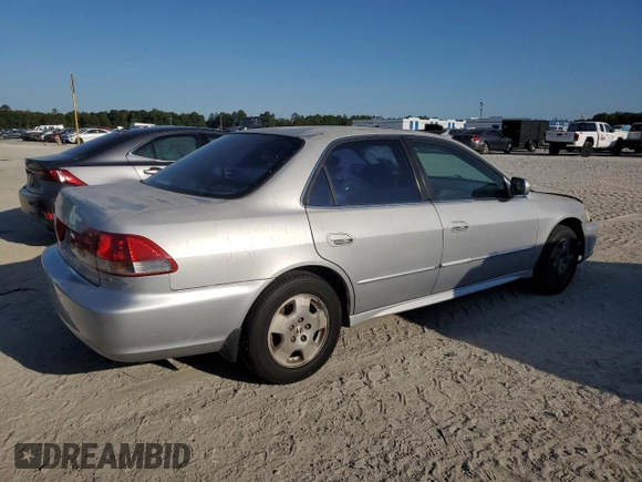 2001 Honda Accord EX z VIN 1HGCG16531A063589, wystawiony jako Copart lot #57875015 z przebiegiem Nie podano mil oraz Szkoda całkowita • Salvage title. Historia ofert i sprzedaży dostępna na DreamBid. Obrazek 3.