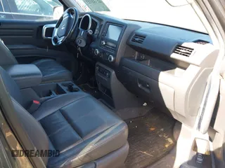 2008 Honda Ridgeline RTL z VIN 2HJYK16518H518451, wystawiony jako IAAI lot #42332723 z przebiegiem 295 375 mil mil oraz . Historia ofert i sprzedaży dostępna na DreamBid. Obrazek 5.