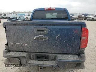 2019 Chevrolet Colorado 2WD Work Truck z VIN 1GCGSBEN4K1279863, wystawiony jako Copart lot #49183645 z przebiegiem 92 728 mil mil oraz Szkoda całkowita • Salvage title. Historia ofert i sprzedaży dostępna na DreamBid. Obrazek 6.