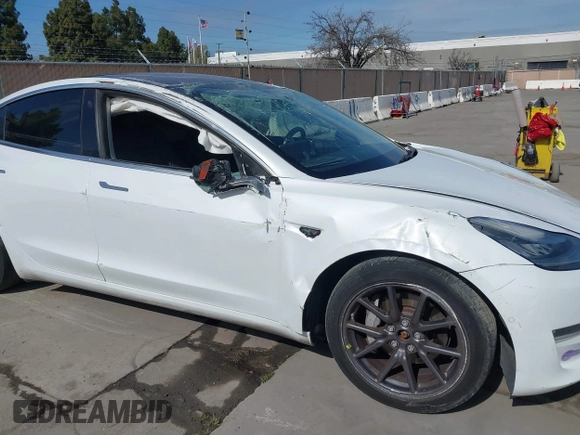 2018 Tesla Model 3 Long Range Battery with VIN 5YJ3E1EB7JF108519, listed as a IAAI auction lot 41835266 with 120,662 mi miles and . Bid and sale history available at DreamBid. Image 6.