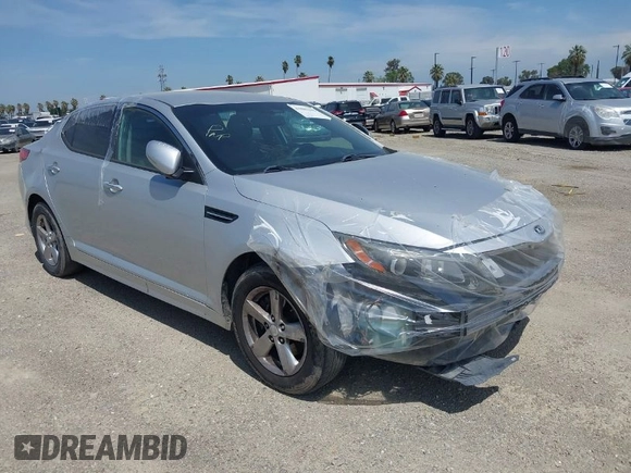 2015 Kia Optima LX with VIN 5XXGM4A74FG381316, listed as a IAAI auction lot 41885940 with 128,984 mi miles. Bid and sale history available at carsss.com. Image 1.