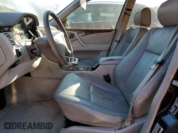 2002 Mercedes-Benz E-Class with VIN WDBJF65J32B494321, listed as a Copart auction lot 77557334 with 198,820 mi miles and Salvage Title. Bid and sale history available at carsss.com. Image 7.