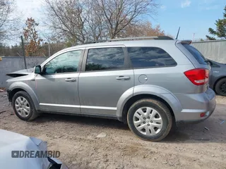 2019 Dodge Journey SE with VIN 3C4PDCBB0KT719211, listed as a IAAI auction lot 41823499 with 151,569 mi miles and . Bid and sale history available at DreamBid. Image 14.