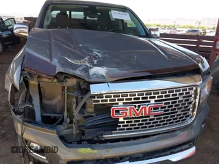 2017 GMC Canyon 4WD Denali z VIN 1GTG6EENXH1315022, wystawiony jako IAAI lot #42152968 z przebiegiem 108 933 mil mil oraz . Historia ofert i sprzedaży dostępna na DreamBid. Obrazek 6.