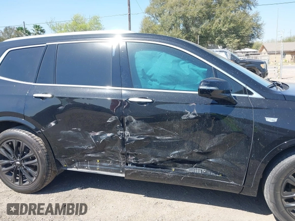 2021 Cadillac XT6 Premium Luxury z VIN 1GYKPCRS9MZ221232, wystawiony jako IAAI lot #41783431 z przebiegiem 69 367 mil mil oraz . Historia ofert i sprzedaży dostępna na DreamBid. Obrazek 14.