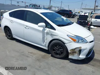 2013 Toyota Prius One z VIN JTDKN3DUXD5657826, wystawiony jako IAAI lot #42346122 z przebiegiem 129 882 mil mil oraz . Historia ofert i sprzedaży dostępna na DreamBid. Obrazek 1.