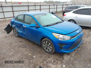 2022 Kia Rio S with VIN 3KPA24AD0NE458613, listed as a IAAI auction lot 41646100 with 106,859 mi miles and . Bid and sale history available at carsss.com. Image 1.