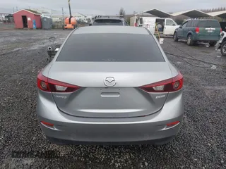 2016 Mazda Mazda3 i Sport with VIN 3MZBM1U76GM306988, listed as a IAAI auction lot 41286055 with 116,175 mi miles. Bid and sale history available at carsss.com. Image 17.
