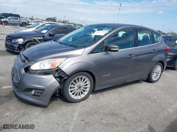 2014 Ford C-Max Hybrid SEL with VIN 1FADP5BU2EL507925, listed as a IAAI auction lot 41817702 with 137,490 mi miles. Bid and sale history available at carsss.com. Image 2.