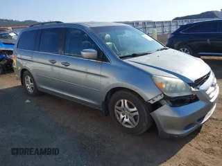2007 Honda Odyssey EX-L with VIN 5FNRL38707B044142, listed as a IAAI auction lot 42094414 with 173,963 mi miles. Bid and sale history available at carsss.com. Image 1.