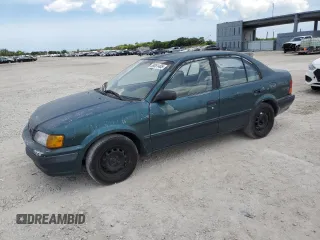 1995 Toyota Tercel DX z VIN JT2EL56E8S7035577, wystawiony jako Copart lot #59051405 z przebiegiem 231 926 mil mil oraz Czysty tytuł • Clean title. Historia ofert i sprzedaży dostępna na DreamBid. Obrazek 1.