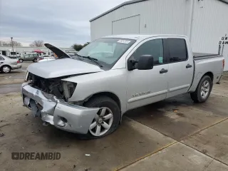 2011 Nissan Titan SL with VIN 1N6AA0ED2BN305628, listed as a Copart auction lot 85012324 with 188,329 mi miles and Salvage Title. Bid and sale history available at carsss.com. Image 1.