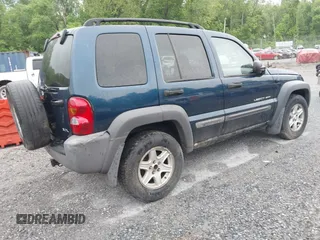 2003 Jeep Liberty Sport with VIN 1J4GL48K63W585973, listed as a IAAI auction lot 42235322 with 316,872 mi miles and . Bid and sale history available at DreamBid. Image 4.