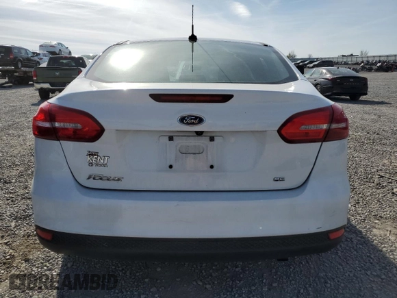 2017 Ford Focus SE z VIN 1FADP3F22HL312683, wystawiony jako Copart lot #53385315 z przebiegiem 88 751 mil mil oraz Szkoda całkowita • Salvage title. Historia ofert i sprzedaży dostępna na DreamBid. Obrazek 6.