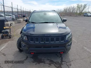 2020 Jeep Compass Trailhawk with VIN 3C4NJDDB7LT129673, listed as a IAAI auction lot 41811055 with 30,106 mi miles and . Bid and sale history available at carsss.com. Image 12.