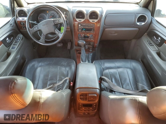 2004 GMC Envoy SLE with VIN 1GKDT13S142197514, listed as a Copart auction lot 89014465 with 202,790 mi miles and Salvage Title. Bid and sale history available at carsss.com. Image 8.