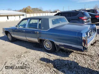 1992 Cadillac Brougham z VIN 1G6DW54E7NR707492, wystawiony jako Copart lot #79950214 z przebiegiem 263 624 mil mil oraz Tytuł czysty. Historia ofert i sprzedaży dostępna na DreamBid. Obrazek 2.