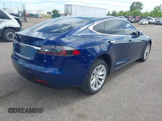 2016 Tesla Model S 70 with VIN 5YJSA1E18GF174200, listed as a IAAI auction lot 42274415 with 65,231 mi miles and . Bid and sale history available at DreamBid. Image 4.