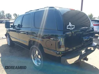 2003 Chevrolet Tahoe LS z VIN 1GNEC13T53J331221, wystawiony jako IAAI lot #42422243 z przebiegiem Nie podano mil oraz . Historia ofert i sprzedaży dostępna na DreamBid. Obrazek 3.