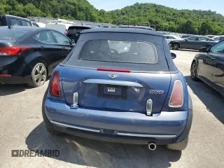 2005 MINI Convertible z VIN WMWRF33435TF60350, wystawiony jako Copart lot #50545005 z przebiegiem 91 078 mil mil oraz Szkoda całkowita • Salvage title. Historia ofert i sprzedaży dostępna na DreamBid. Obrazek 6.