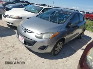 2014 Mazda 2 Sport with VIN JM1DE1KY6E0189739, listed as a Copart auction lot 76468914 with 107,164 mi miles and Salvage Title. Bid and sale history available at carsss.com. Image 1.
