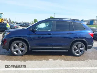 2020 Honda Passport Touring z VIN 5FNYF8H94LB015299, wystawiony jako IAAI lot #42064416 z przebiegiem 62 397 mil mil oraz . Historia ofert i sprzedaży dostępna na DreamBid. Obrazek 14.