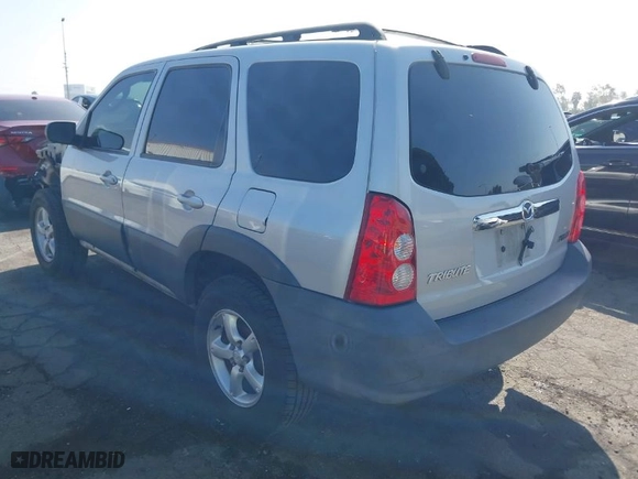 2006 Mazda Tribute i with VIN 4F2YZ02Z26KM38777, listed as a IAAI auction lot 41673856 with 165,665 mi miles. Bid and sale history available at carsss.com. Image 3.