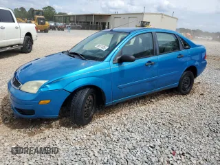 2007 Ford Focus S with VIN 1FAFP34N67W101523, listed as a Copart auction lot 56521835 with 239,505 mi miles and Salvage title. Bid and sale history available at DreamBid. Image 1.