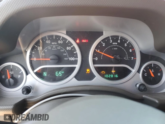 2010 Jeep Wrangler Unlimited Sahara with VIN 1J4BA5H11AL107228, listed as a Copart auction lot 54761705 with 102,816 mi miles and Clean Title. Bid and sale history available at carsss.com. Image 9.