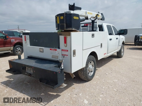 2022 Ram 2500 Tradesman with VIN 3C6UR5HJ8NG366140, listed as a IAAI auction lot 42468290 with 51,581 mi miles and . Bid and sale history available at DreamBid. Image 4.