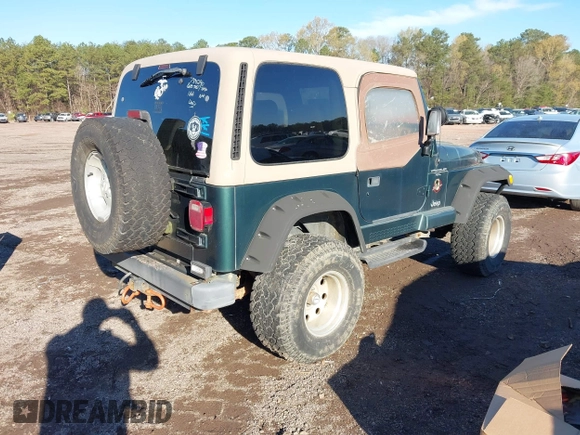 2000 Jeep Wrangler Sahara with VIN 1J4FA59S2YP734290, listed as a IAAI auction lot 41874866 with 201,036 mi miles. Bid and sale history available at carsss.com. Image 4.