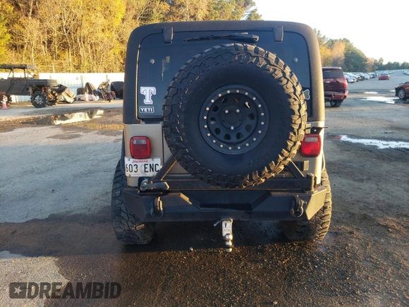 2004 Jeep Wrangler Rubicon with VIN 1J4FA69S74P787812, listed as a Copart auction lot 84715464 with 150,320 mi miles and Salvage Title. Bid and sale history available at carsss.com. Image 6.